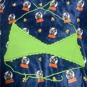 Out from under lime green crochet top
